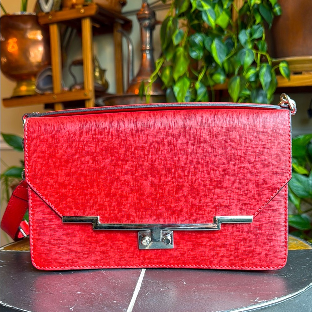 Floto Firenze leather clutch watermelon color and silver hardware made in Italy